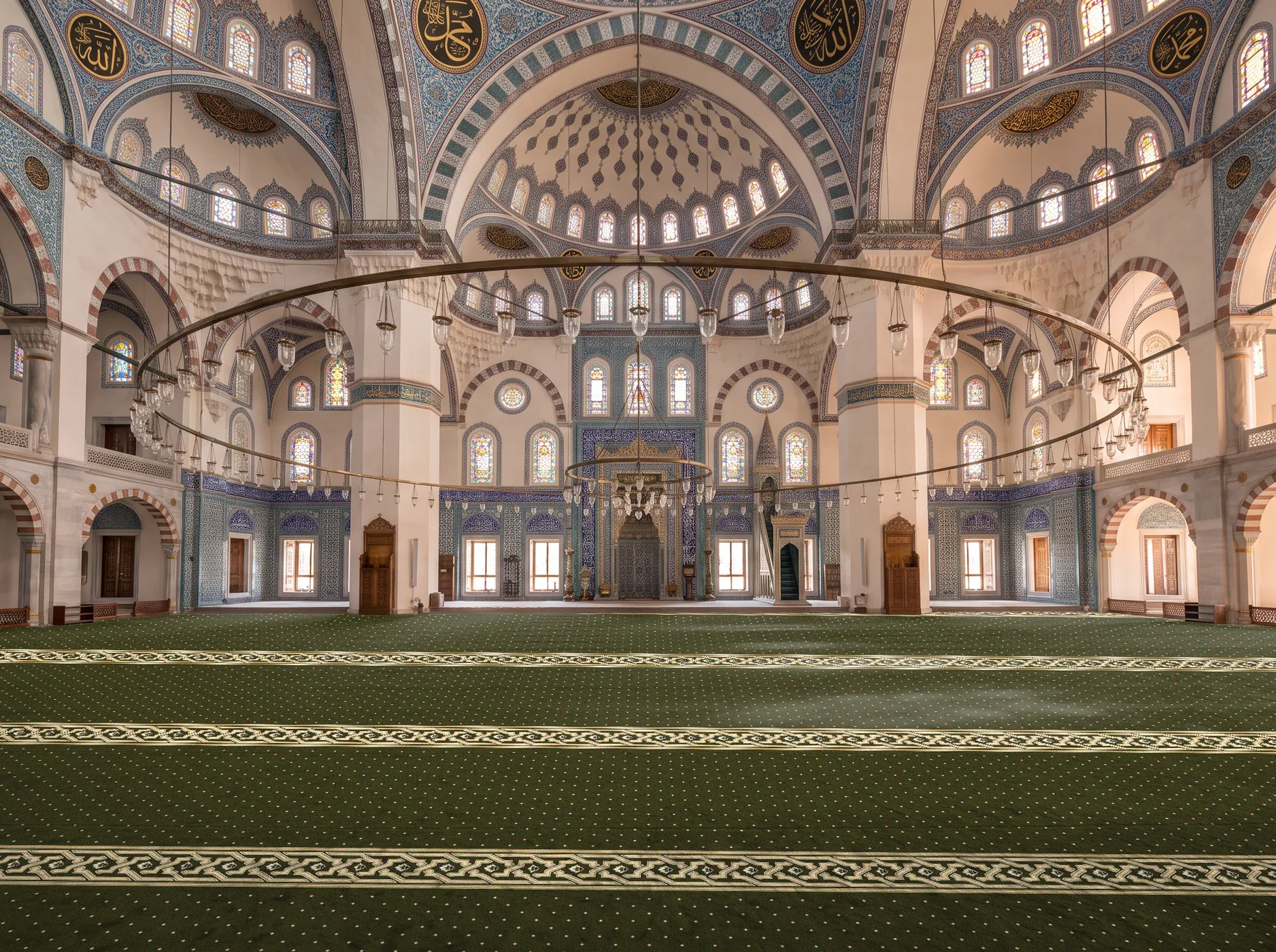 Aqsa Green Turkish Masjid carpet running the full width of a domed prayer hall